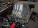 1978 Ford Bronco - Engine block and oil pan assembly, likely during a rebuild or repair process.