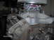 1978 Ford Bronco - Close-up view of an engine's intake manifold, carburetor, and air filter assembly.