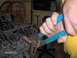 1978 Ford Bronco - A mechanic uses pliers to work on the valve train of an engine, with a date stamp of 06/30/2005 visible.
