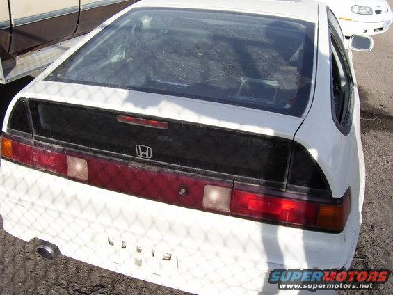 White Honda CRX rear view. Distinctive taillights and rear window