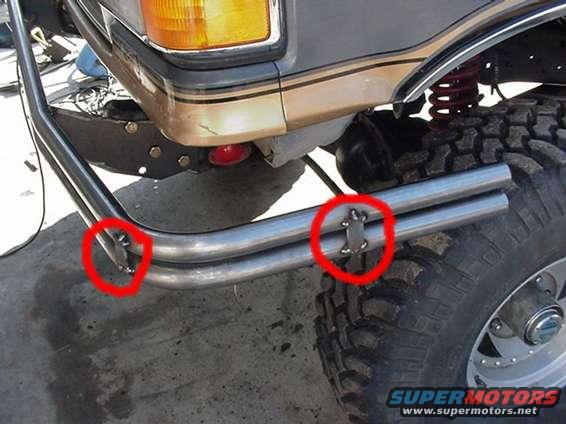 Custom front bumper with red circles on mounting hardware