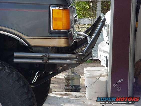 Dark gray fender and custom tubular bumper with chrome trim