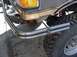 1988 Ford Bronco - A custom bumper is installed on a vehicle with a large off-road tire visible.