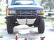 1988 Ford Bronco - This 1987 Ford Bronco features a custom brush guard and aggressive off-road tires, suggesting modifications beyond its original factory app…