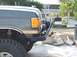 1988 Ford Bronco - Close-up of the front fender and bumper assembly on a 1988 Ford Bronco.