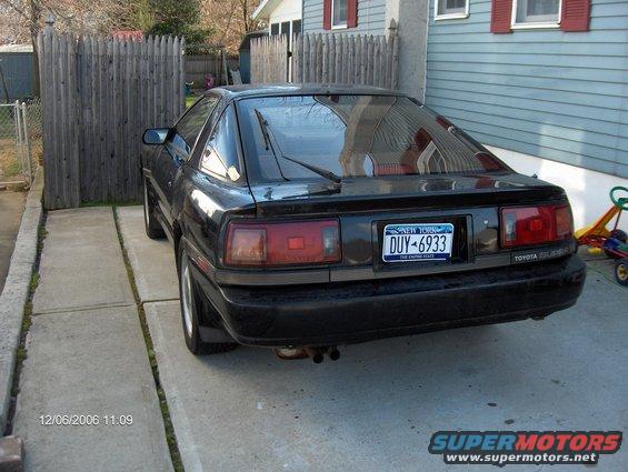 1986 Toyota Supra parked in driveway, rear view