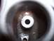 1979 Ford Bronco - This image shows a close-up view of a valve stem seal, a critical engine component.