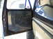 1992 Ford Mustang - Custom diamond plate door panel installed in an older vehicle's interior.