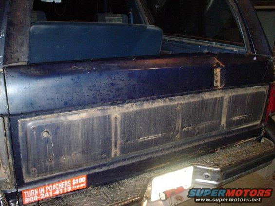 1984 Ford Bronco rear tailgate panel with 'Turn in Poachers' sticker