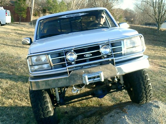 Silver 1991 Ford Bronco front view with winch