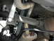 1990 Ford Mustang - Underside view of the rear suspension and exhaust system on a 1990 Ford Mustang.