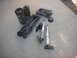 1990 Ford Mustang - Various suspension components laid out on a concrete surface, including springs, control arms, and shock absorbers.