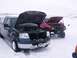 2003 Ford Ranger - Two trucks sit in the snow with their hoods open, suggesting a mechanical issue during a winter outing.