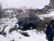 2003 Ford Ranger - Off-road vehicles stuck in snow during a winter excursion.