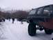 2003 Ford Ranger - Group of people and vehicles in a snowy outdoor scene.