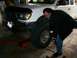 Tony loosening lug nuts