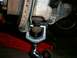 Another shot showing two jaw puller pressing out lower ball joint