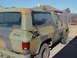 1984 Chevrolet Blazer - This 1973 Chevrolet K5 Blazer is viewed from the rear quarter, displaying its camouflage paint scheme and some damage.