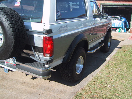 Rear view of a 1992 Ford Bronco with a spare tire mounted on the tailgate