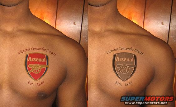 Man with Arsenal crest tattoo on chest, one side colored, other side shaded