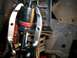 3-jaw puller pressing new bj into knuckle - note steel plates underneath bj to keep puller stud from...