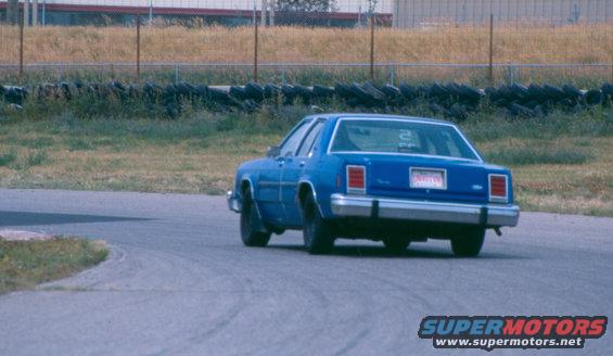 2003-pic-2.jpg same day going into turn 10, notice the difference in body roll