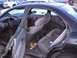 2003 Ford Ranger - Interior view of a sedan, with other vehicles parked nearby.