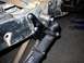 1984 Ford Bronco - This image shows the underside of a vehicle, focusing on the leaf spring and its attachment points.