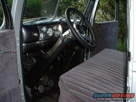 1946 Chevrolet C/K Pickup interior with custom gauges and steering wheel