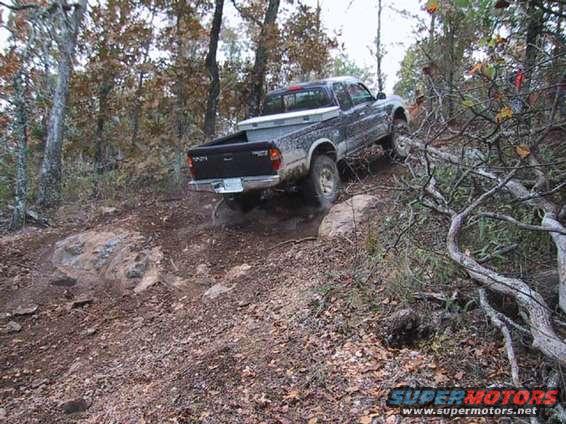 rob_giving_it_hell_3.jpg This doesn't look that steep but it was.  Rob giving it hell. He only knows one speed and that's "Wide Open."