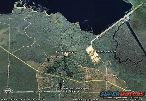 Aerial view of a rural area with roads, water, and a sand pit labeled 'Rodman sand pit'