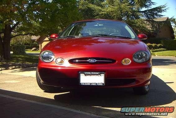 1999 Ford Taurus front view, red paint, Folsom Lake Ford license plate
