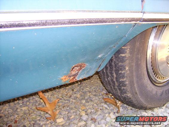 dsci0635.jpg More rust, the passenger side quarter panel