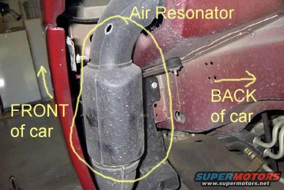 Air resonator assembly on a red vehicle