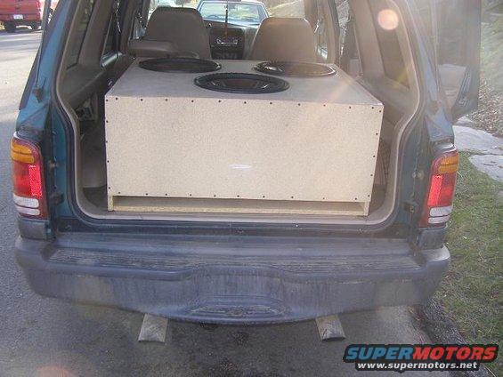 Rear view of a 1998 Mercury Mountaineer with a subwoofer box