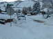Snow plow got stuck so he called for help.