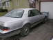 1988 Ford Thunderbird - This 1988 Ford Thunderbird is seen from the rear three-quarter angle, parked in a driveway.