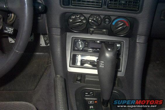1994 Dodge Stealth interior showing dashboard, steering wheel, gear shifter, and radio