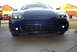 1994 Dodge Stealth - The front of a blue sports car is shown, its distinctive grille and lighting elements.