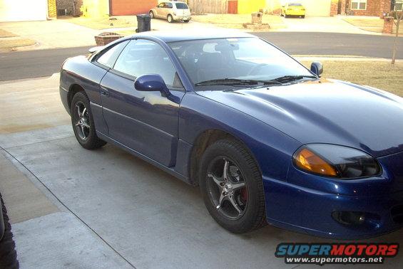 Blue 1994 Dodge Stealth parked on a concrete driveway