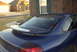 1994 Dodge Stealth - Rear view of a blue 1994 Dodge Stealth coupe a prominent rear spoiler.