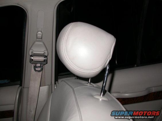 1998 Mercury Grand Marquis interior showing a light-colored headrest and seatbelt