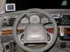 1998 Mercury Grand Marquis - The interior of a 1998 Mercury Grand Marquis shows the dashboard, steering wheel, and center console with aftermarket radio.