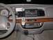 1998 Mercury Grand Marquis - Interior view of a 1998 Mercury Grand Marquis dashboard, an aftermarket stereo system and remote.