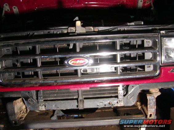 Red 1991 Ford Bronco grille with oval F-M-C emblem
