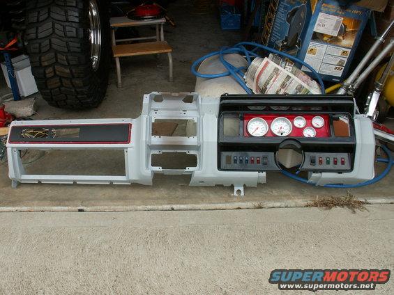 gauges and fascia mocked up for colour check with rest of dash face....drab beige/brown becomes stylish 2006 satin grey with satin red and black highlights throughout truck