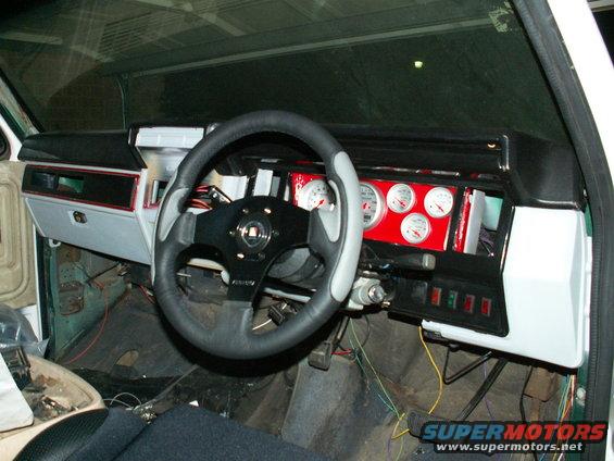 new dash colour, gauges and colour co-ordinated steering wheel