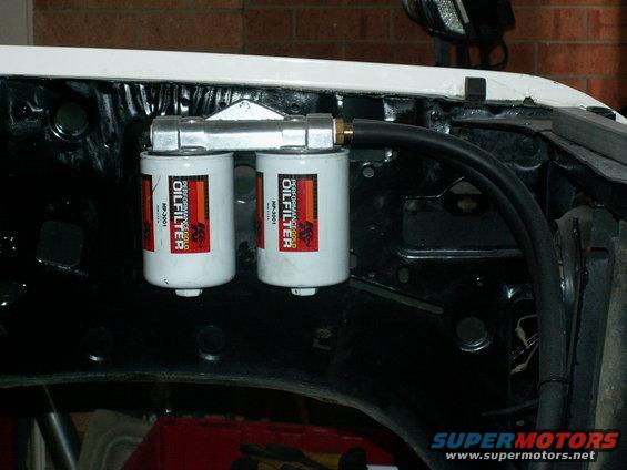 K & N Gold twin remote oil filters up on inner guard....nice easy filter swap with 1 inch spanner!!