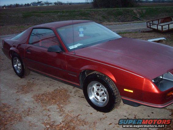 Red coupe, 3/4 front view