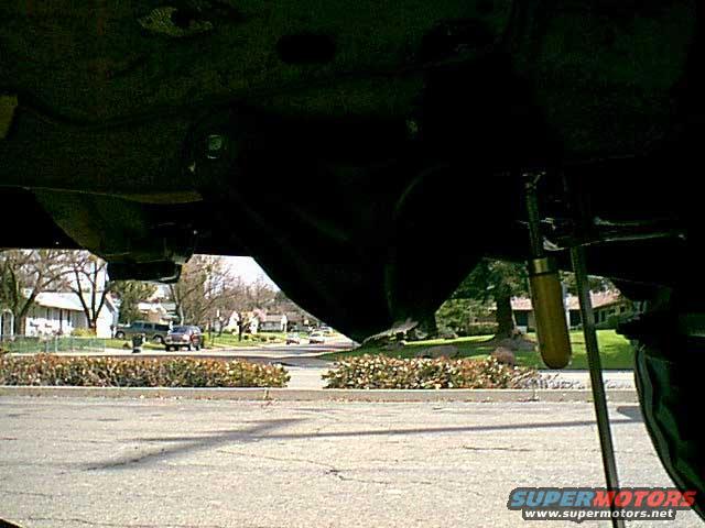 side.jpg i took the stock radius arm mounts and clamped them to the frame. i used the jig to make sure they were 15" farther back.